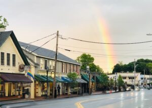 Downtown Ogunquit with Rainbow in sky.