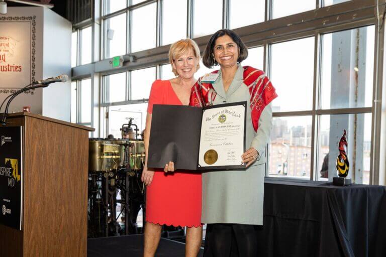 Sheela Murthy, Founder & President of Murthy Law Firm and inductee into the Maryland Business Hall of Fame in 2023, poses with Mary D. Kane, President & CEO of the Maryland Chamber of Commerce during the annual Inspire MD event.