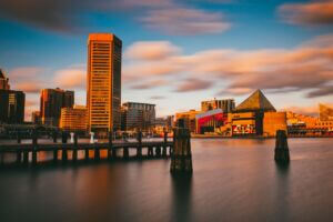 Evening long exposure of the Baltimore Inner Harbor Skyline in Maryland.