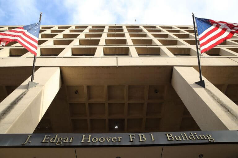 Exterior view looking up at the J. Edgar Hoover FBI Building in Washington, D.C.