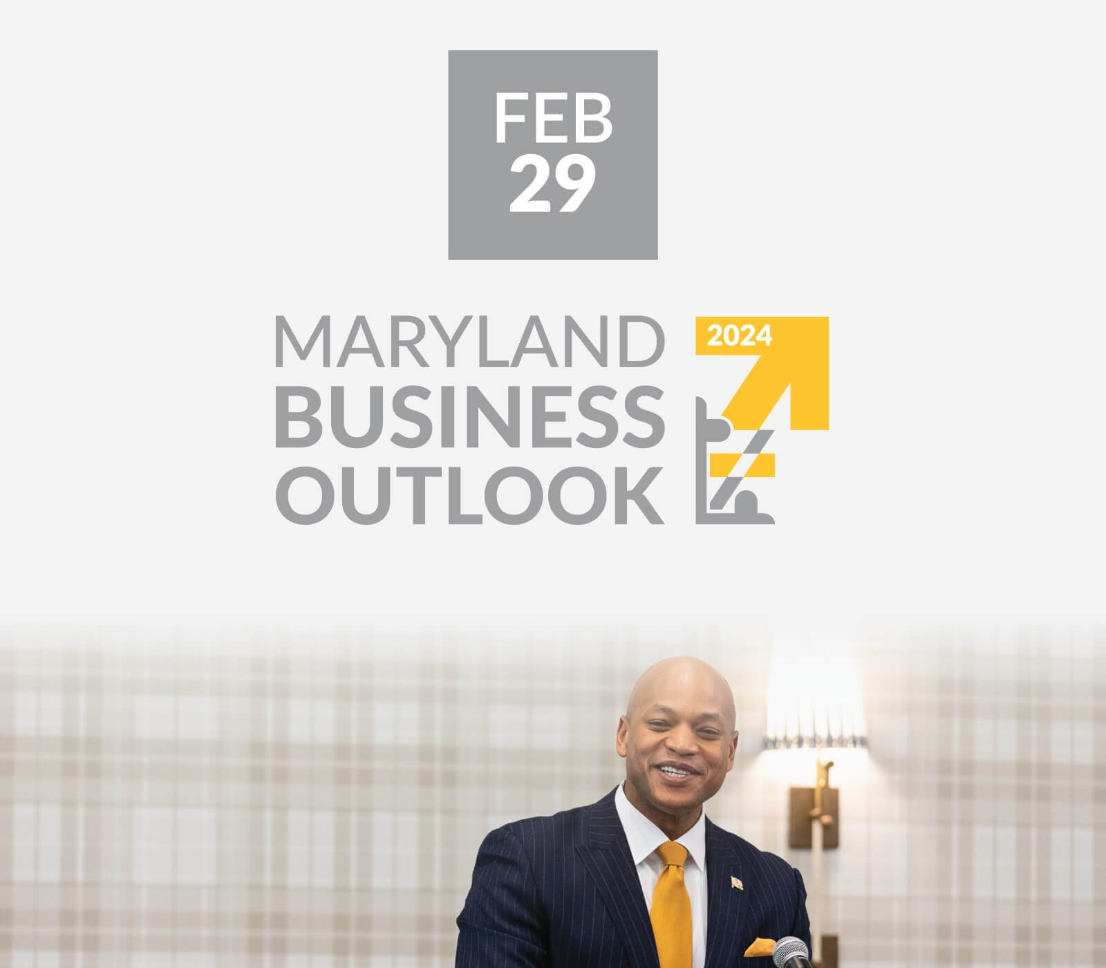 A gray color overlaying a photo showing Maryland Governor Wes Moore speaking from a podium. The text reads Feb 29 with the Maryland Business Outlook 2024 event logo.