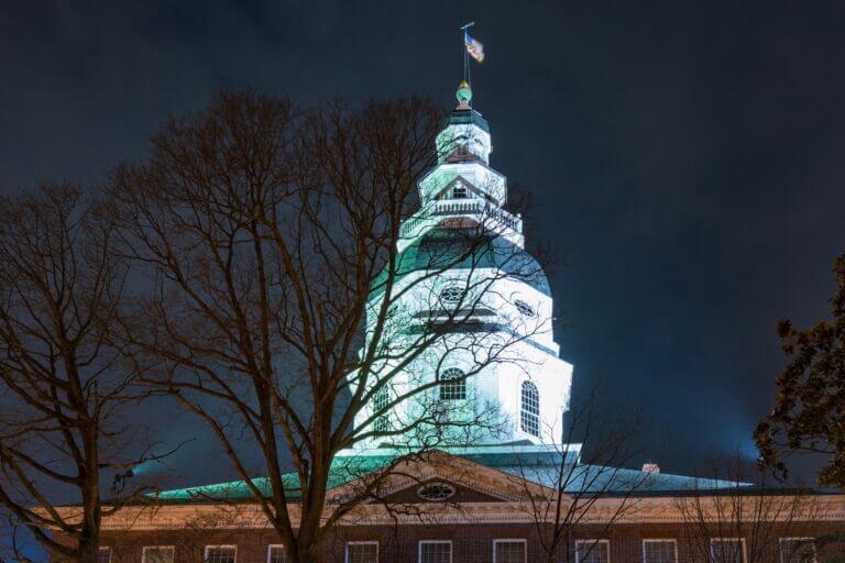 Winter night showing the illuminated Maryland State House dome in downtown Annapolis, Maryland.