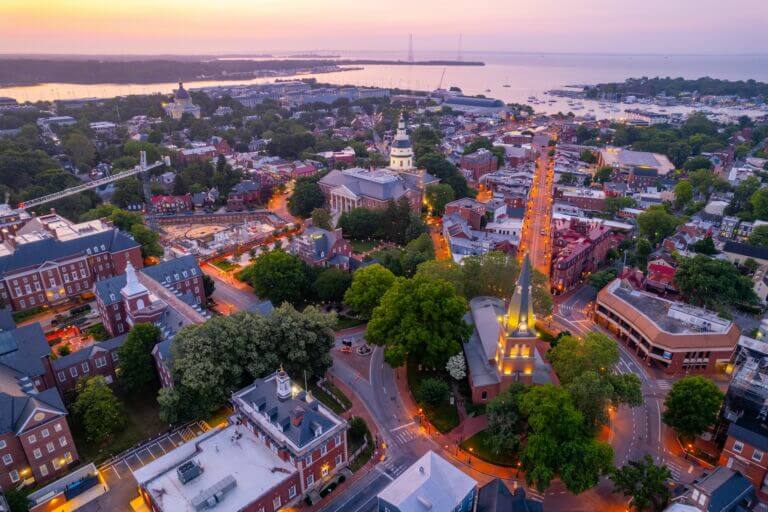 A summer morning aerial view of Annapolis, Maryland and the Chesapeake Bay at sunrise.