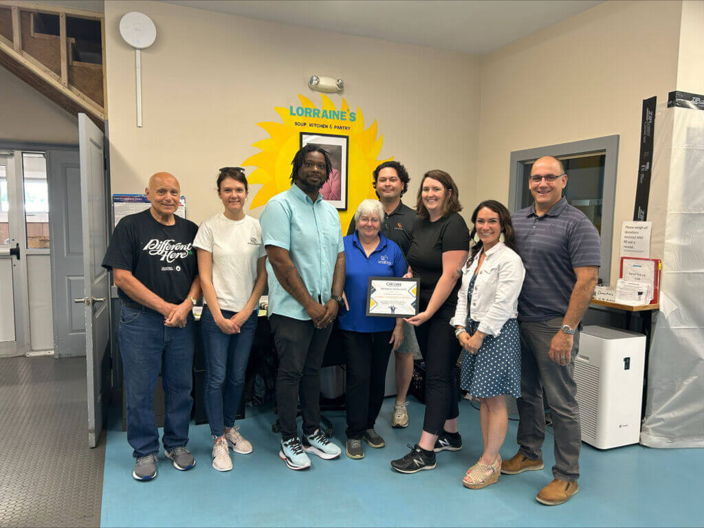 From Left to Right, Lorraine's volunteer Pete, Lynn Morrissette of the Boys &amp; Girls Club of Chicoopee; Lorraine's Operations Manager Jerry; Lorraine's Board President, Donna Marratta; Brion Robert of Westfield Bank; Melissa Breor, Executive Director of the Chicopee Chamber; Heather Leclerc of the Homebuilders and Remodelers Association of Western Mass; and Michael Epaul of Michael Epaul Photography. 