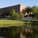 Exterior of the Winter Park Library, as seen across a lake