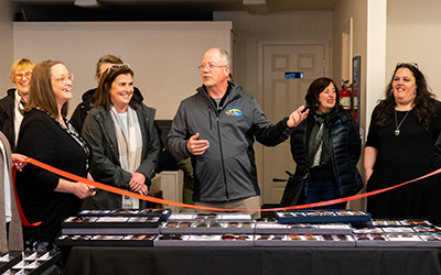 people at a ribbon cutting