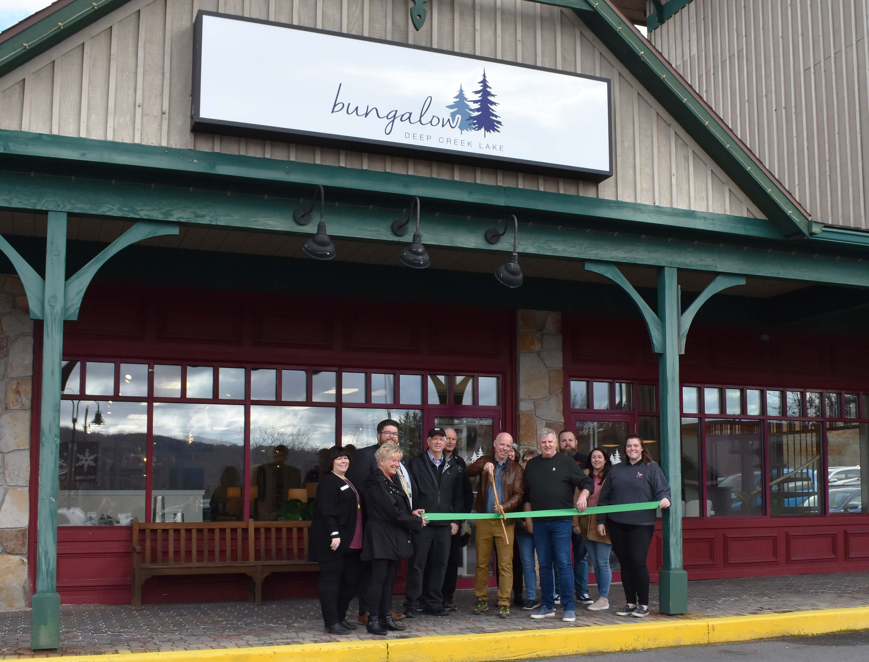On Friday, February 9, the Garrett County Chamber of Commerce partnered with the Garrett County Department of Business Development to hold the first ribbon cutting ceremony of 2024 for the grand opening of Bungalow Deep Creek Lake in McHenry.
