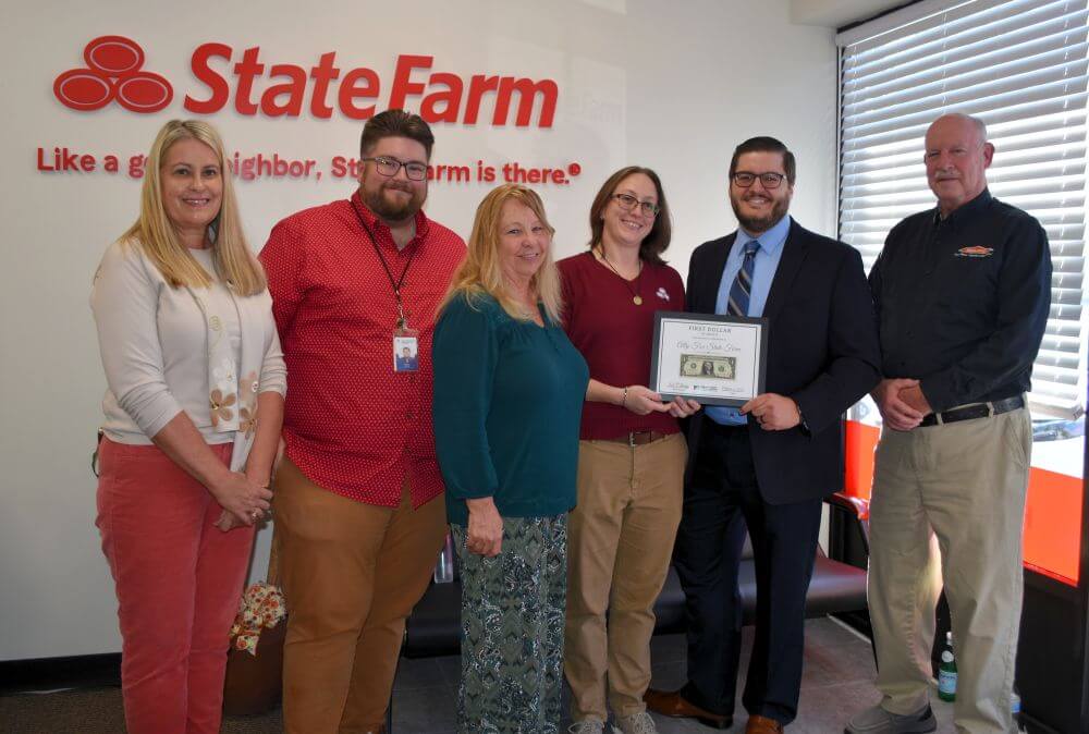 The Garrett County Chamber of Commerce, in partnership with the Garrett County Department of Business Development, hosted a ribbon cutting ceremony on Friday, October 3, 2025, to celebrate the grand opening of Ally Fox’s State Farm office in Oakland, Maryland.