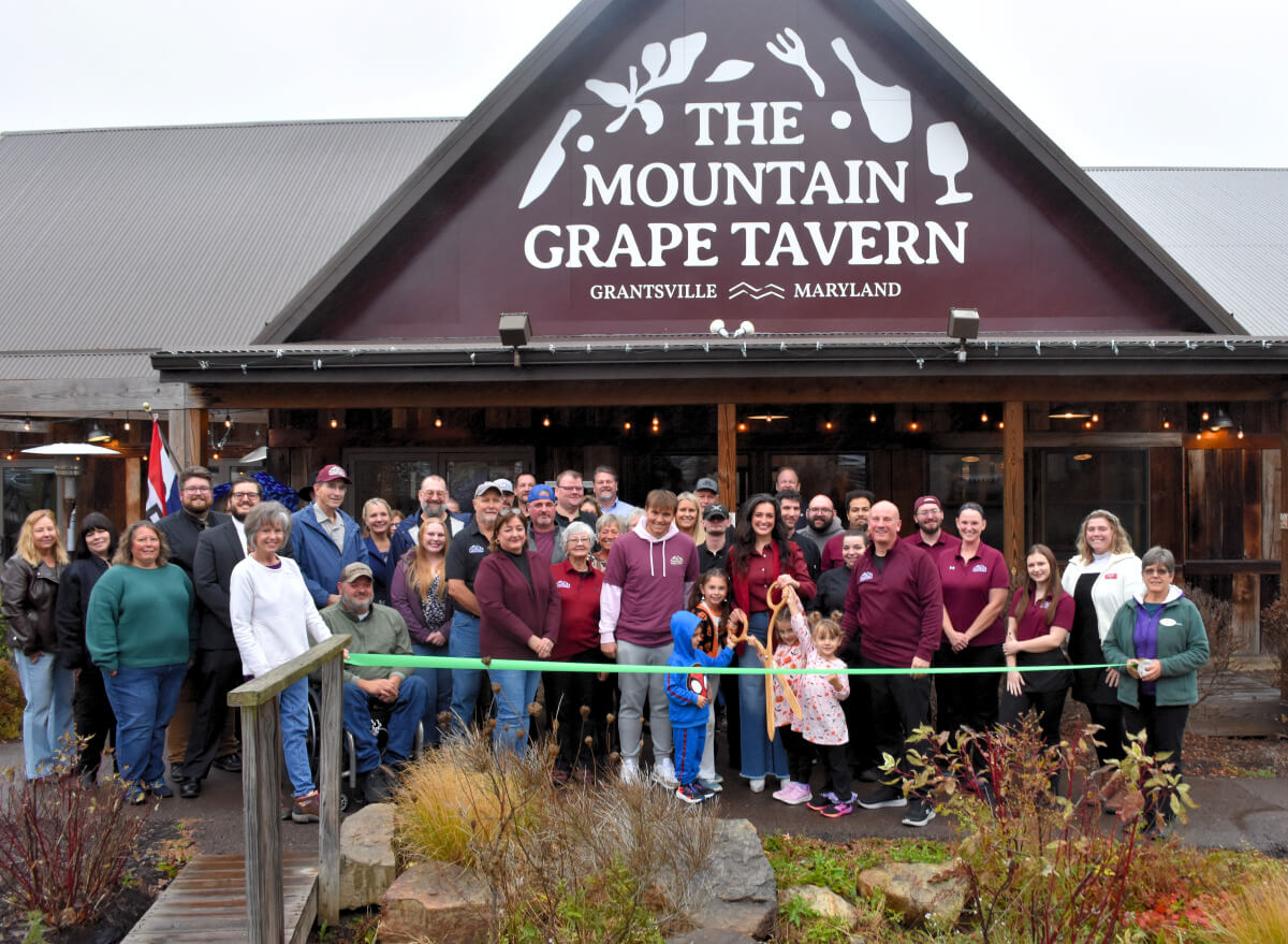The Garrett County Chamber of Commerce, in partnership with the Garrett County Department of Business Development, hosted a ribbon cutting ceremony on Wednesday, October 29, 2025, to celebrate the grand opening of The Mountain Grape Tavern in Grantsville, Maryland.