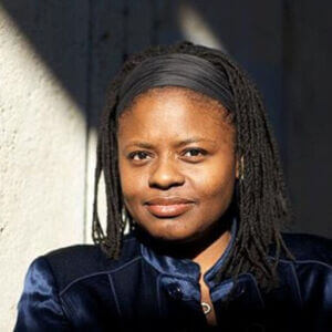 Dr. Jennifer R. Madden's headshot. She is wearing a dark blue top.