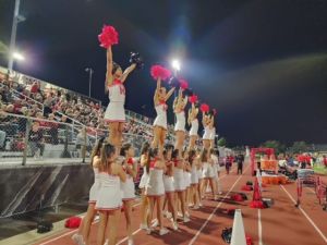 Friday night football varsity cheerleaders