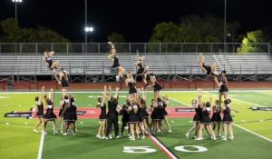 varsity cheerleaders perform half time at FNL - 2