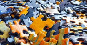 photo of puzzle pieces for blog post about questions of identity, purpose, and the future