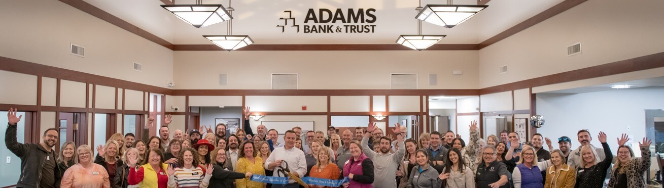 Large group of over 50 people cheering