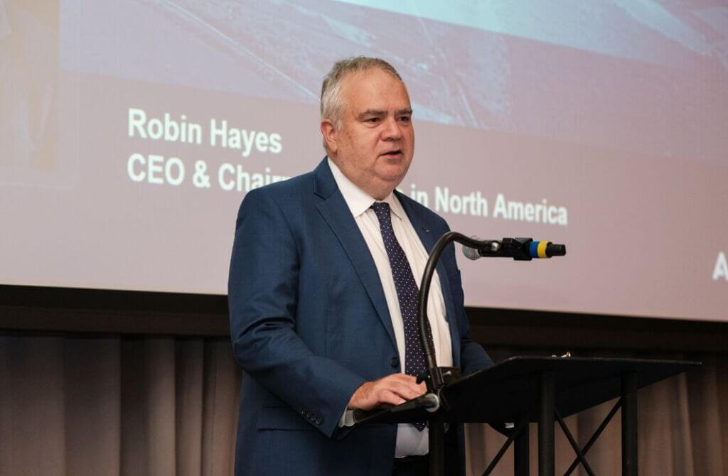 Airbus North America CEO Robin Hayes addresses a crowd of government leaders, community members and manufacturers during Airbus Supplier Day on Aug. 26, 2026, in Rockford, Illinois. | Photo by Mindy Joy Photography.