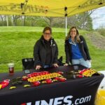 Kunes employees at tent