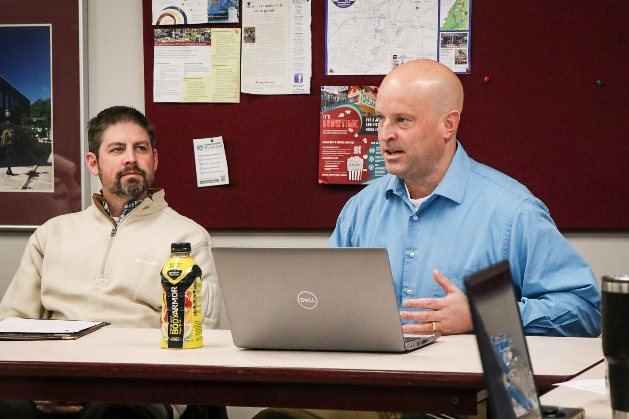 Nathan Smit, project lead (right) and Andy Sorenson, City of Austin Assistant City Engineer (left) discussing the project at the Austin Area Chamber of Commerce's Voice of Business meeting.