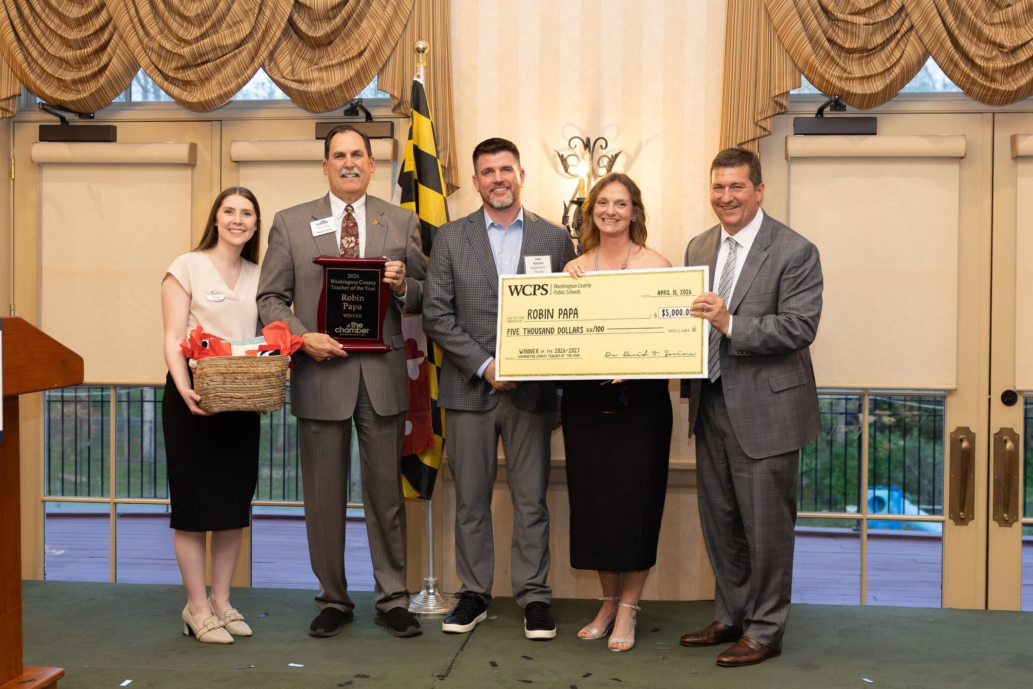 Photo of 2026-2027 Teacher of the Year Robin Papas with her winnings.