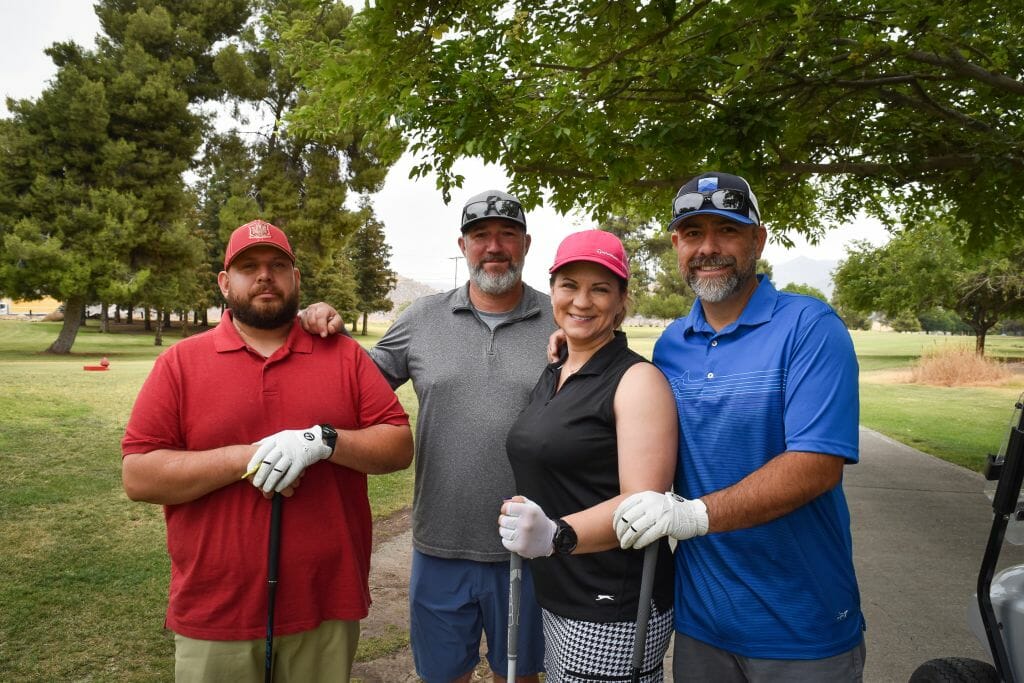 team of 4 at Golf tournament