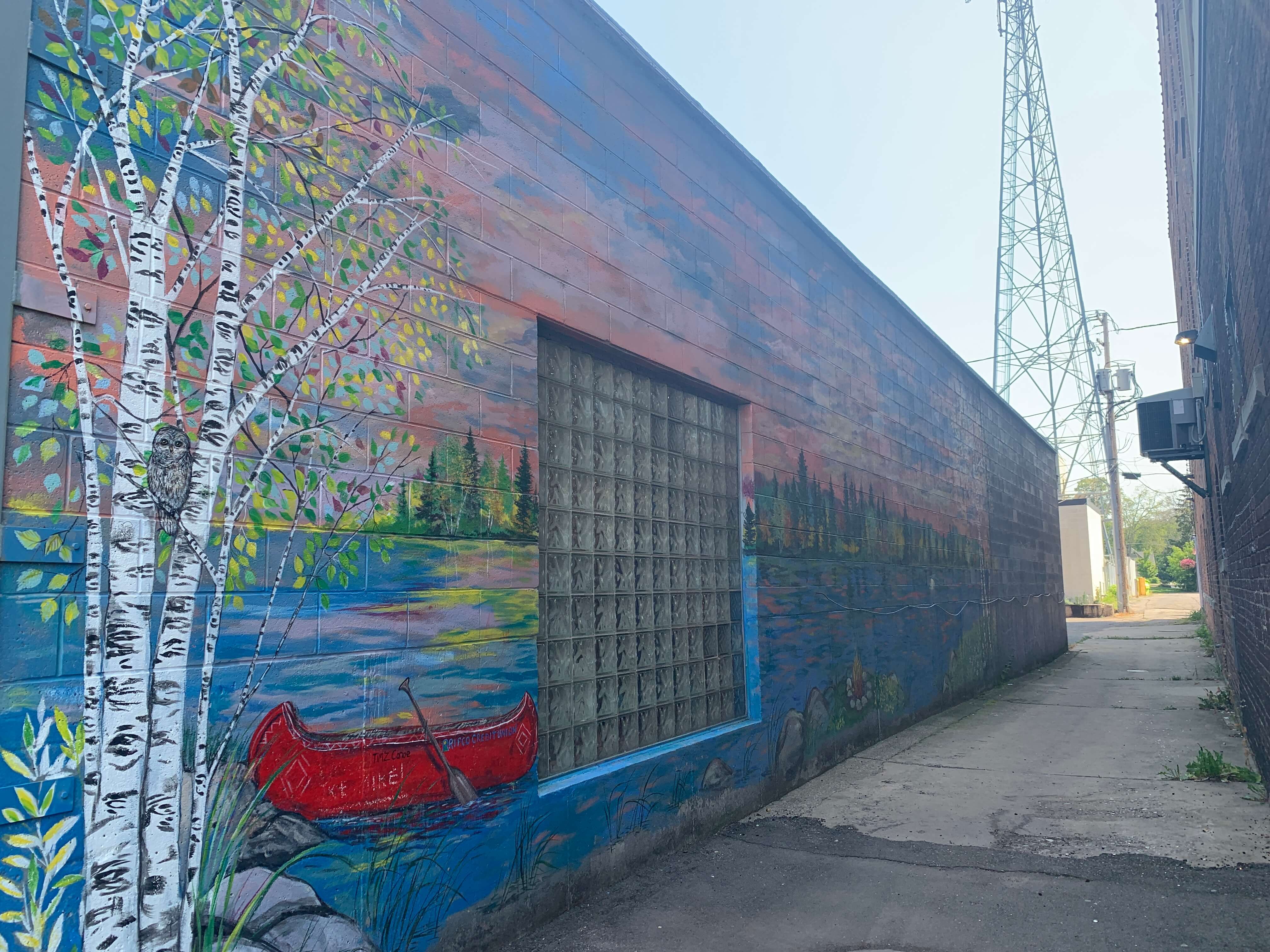 A mural in downtown Rhinelander, Wisconsin Downtown Mural by Natalie Watland