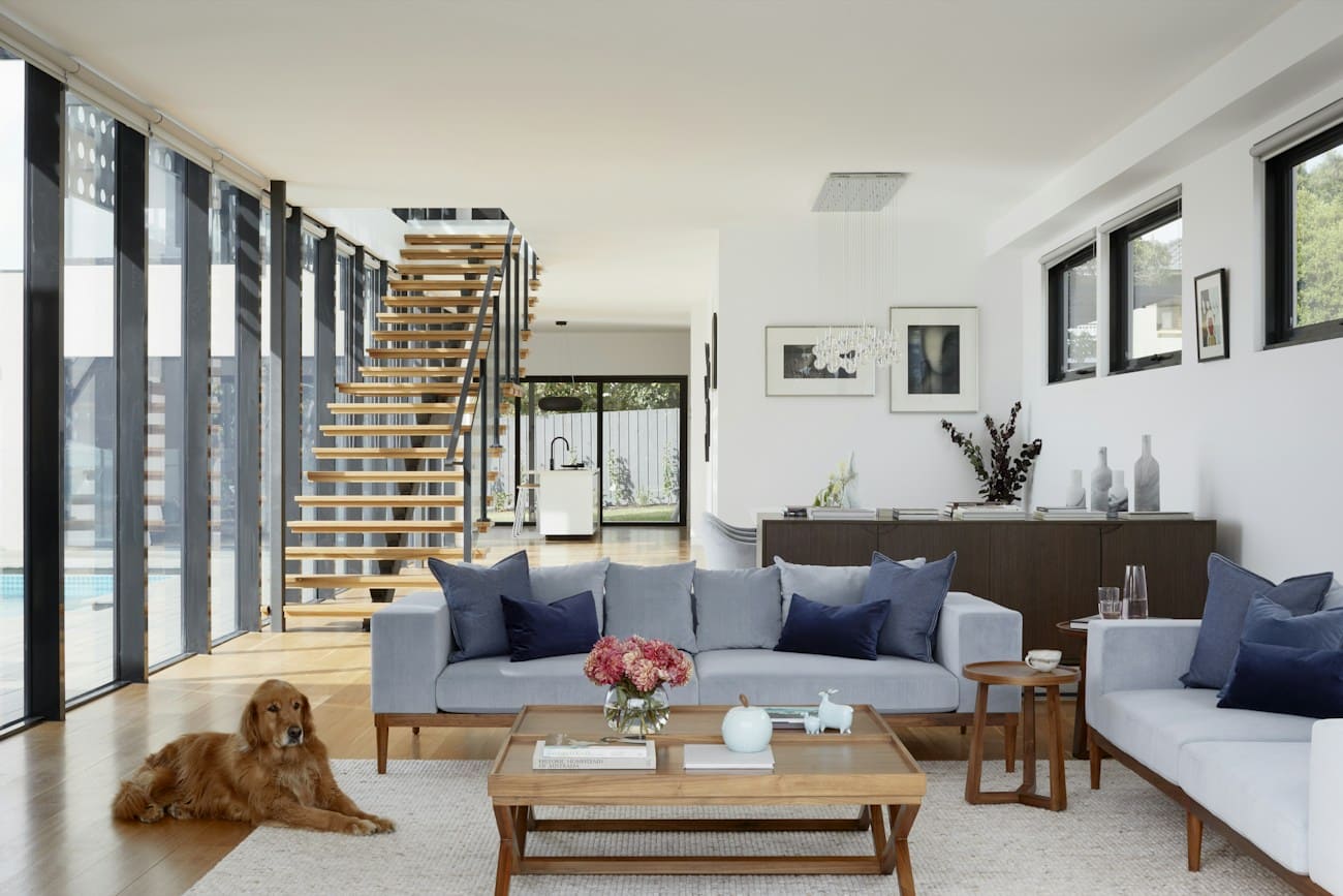 Golden Retriever is laying on the floor of a beautiful home