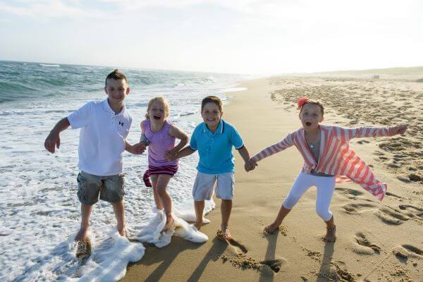 Martha's VIneyard Family on Beach by David Welch