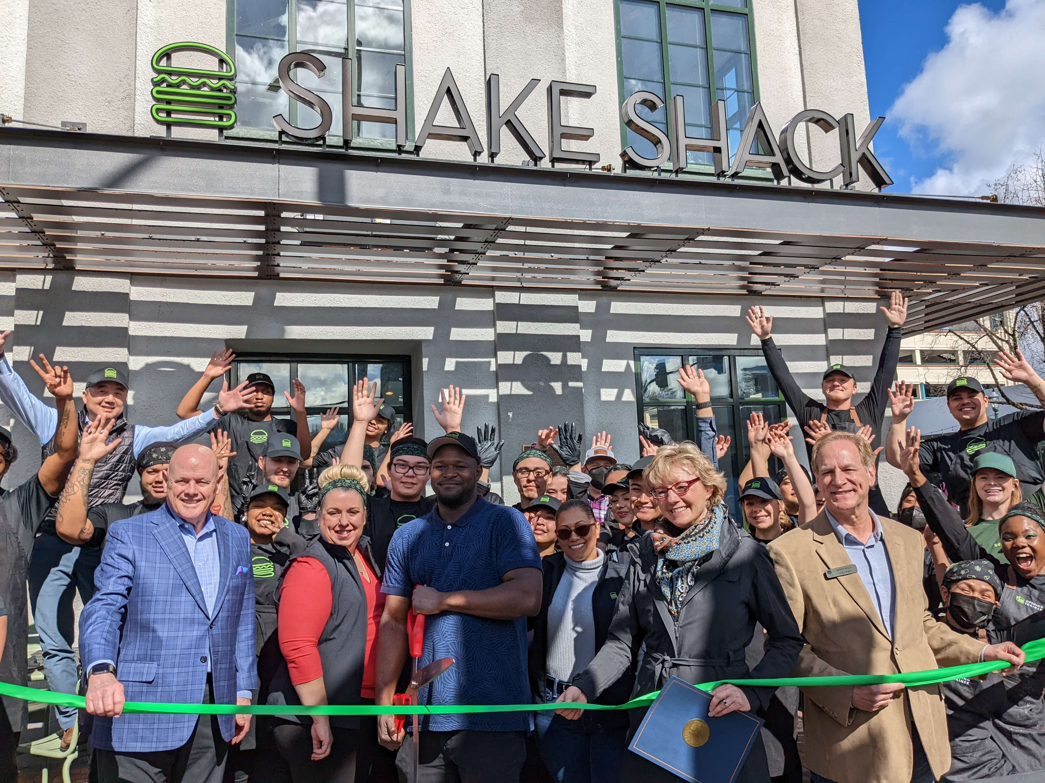 Group gathered for the Shake Shack Ribbon Cutting Ceremony