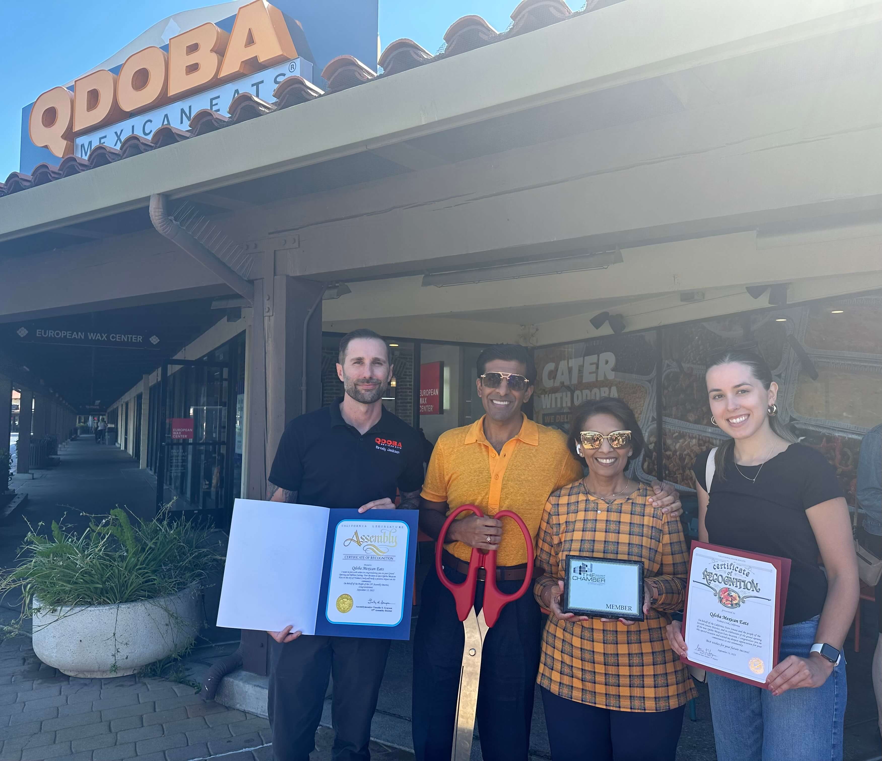 Group gathered for Qdoba Ribbon Cutting