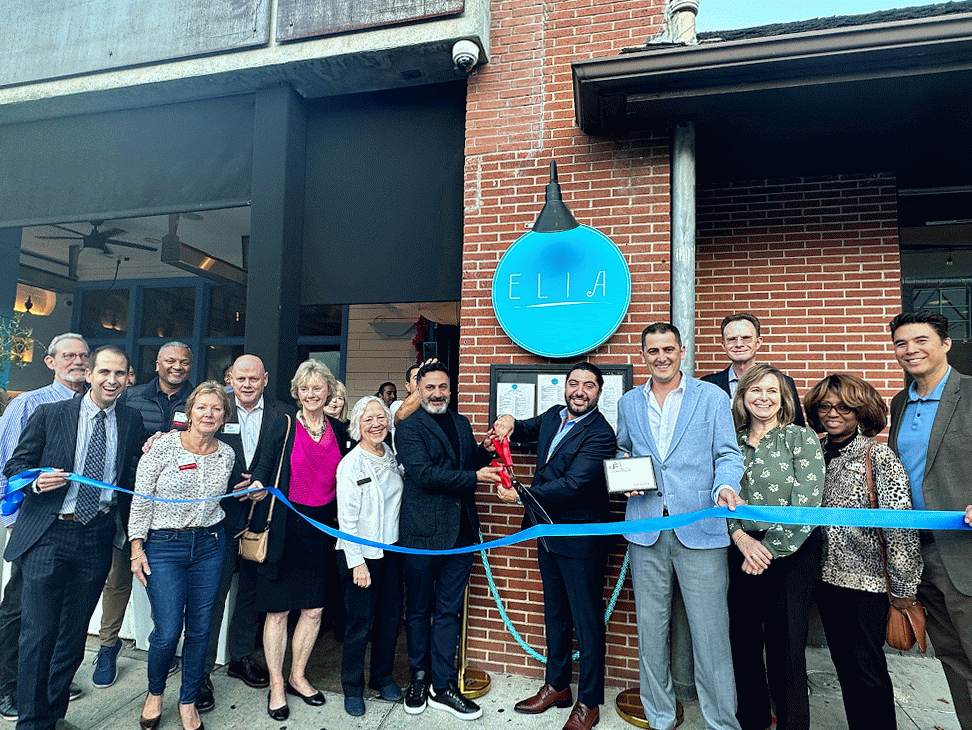 Group gathered for the ribbon cutting ceremony at Elia