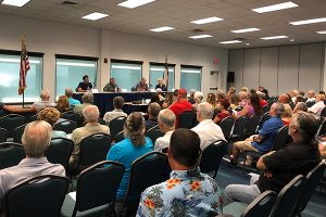 people at candidate forum meeting