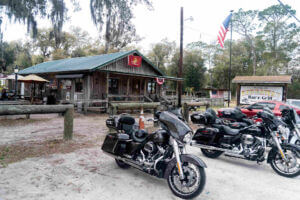The Hideaway Bar_motorcycles in front of building_Pomona Park_Putnam County_Brandy Jo Hastings_Compressed
