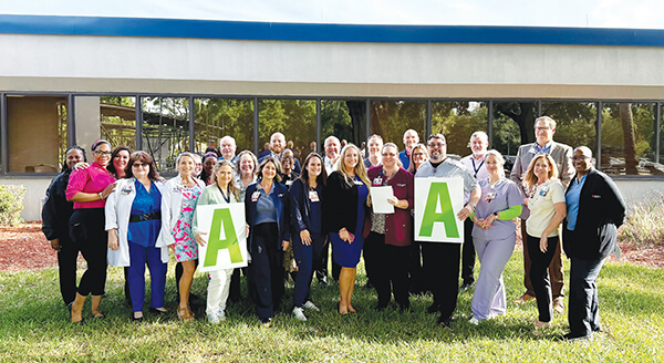 HCA Florida Putnam Hospital staff members celebrate the hospital receiving an A hospital safety grade from The Leapfrog Group.