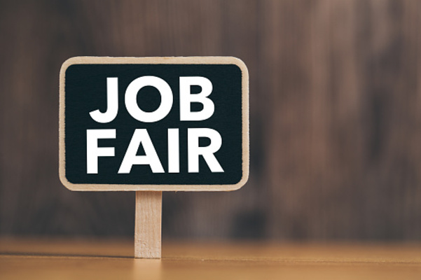 Photo of a sign reading "Job Fair" for the San Leandro Job Fair.