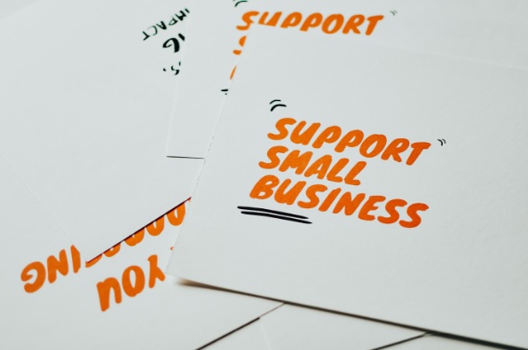 Photo of Small Business Week flyers with the text "Support Small Business."