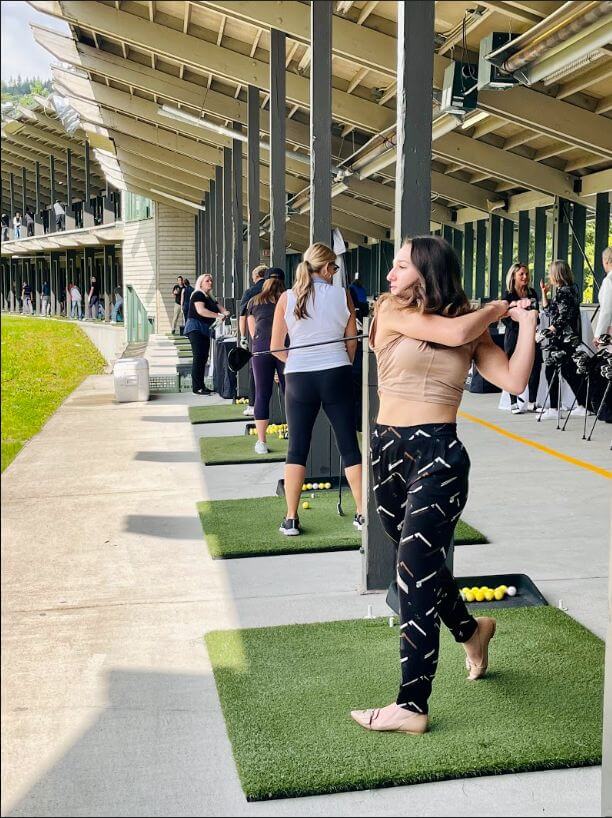 woman practicing golf