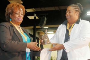 2017 Dennis Maloney award recipient Ayesha Brooks receiving award