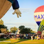 Photo of people and hot air balloons at the Galt Balloon Festival