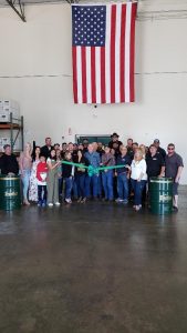 Photo of Frontier Performance Lubrication staff at ribbon cutting
