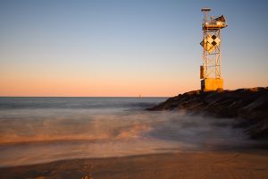 beach and tower on the rocks