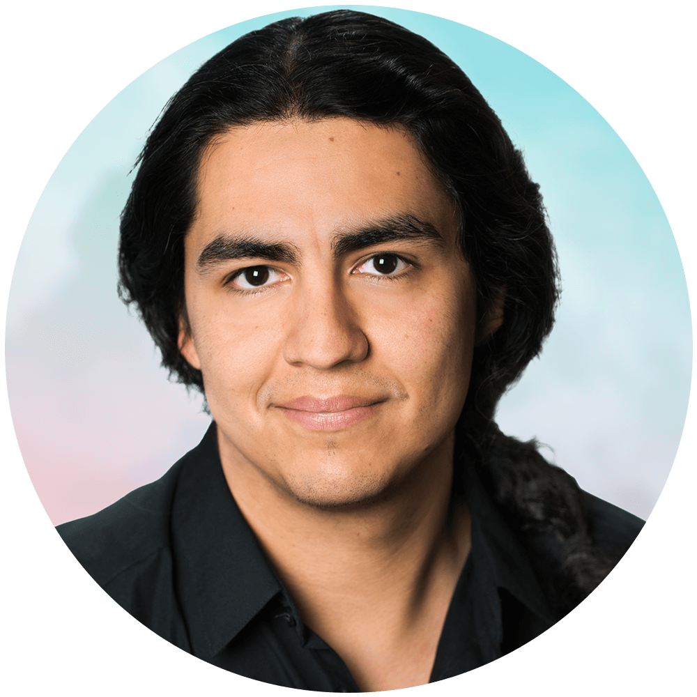 Headshot of a person with black hair, wearing a black shirt upon a neutral background.