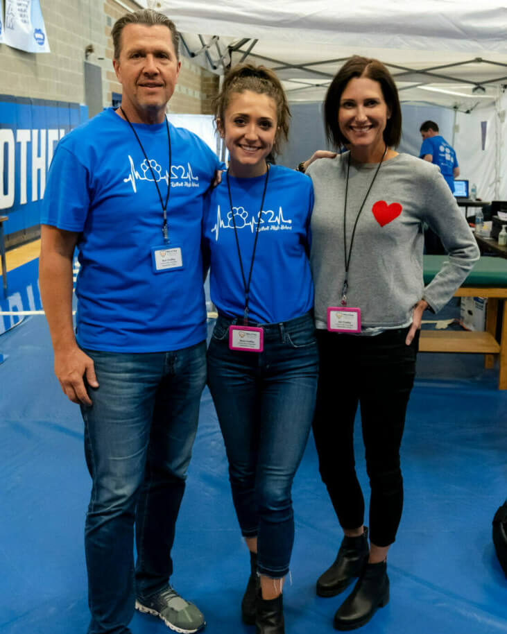 Bella and her parents, Bob &amp; Jen, at Alexander's Hope largest heart screening to date at Bothell High School in 2019.