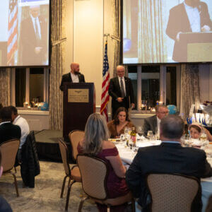 Installing Officer Harrison Beacher and SKCR CEO Russ Hokanson