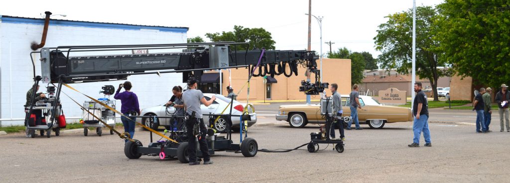 A photo of a camera crane on the set of a production in Clovis, New Mexico