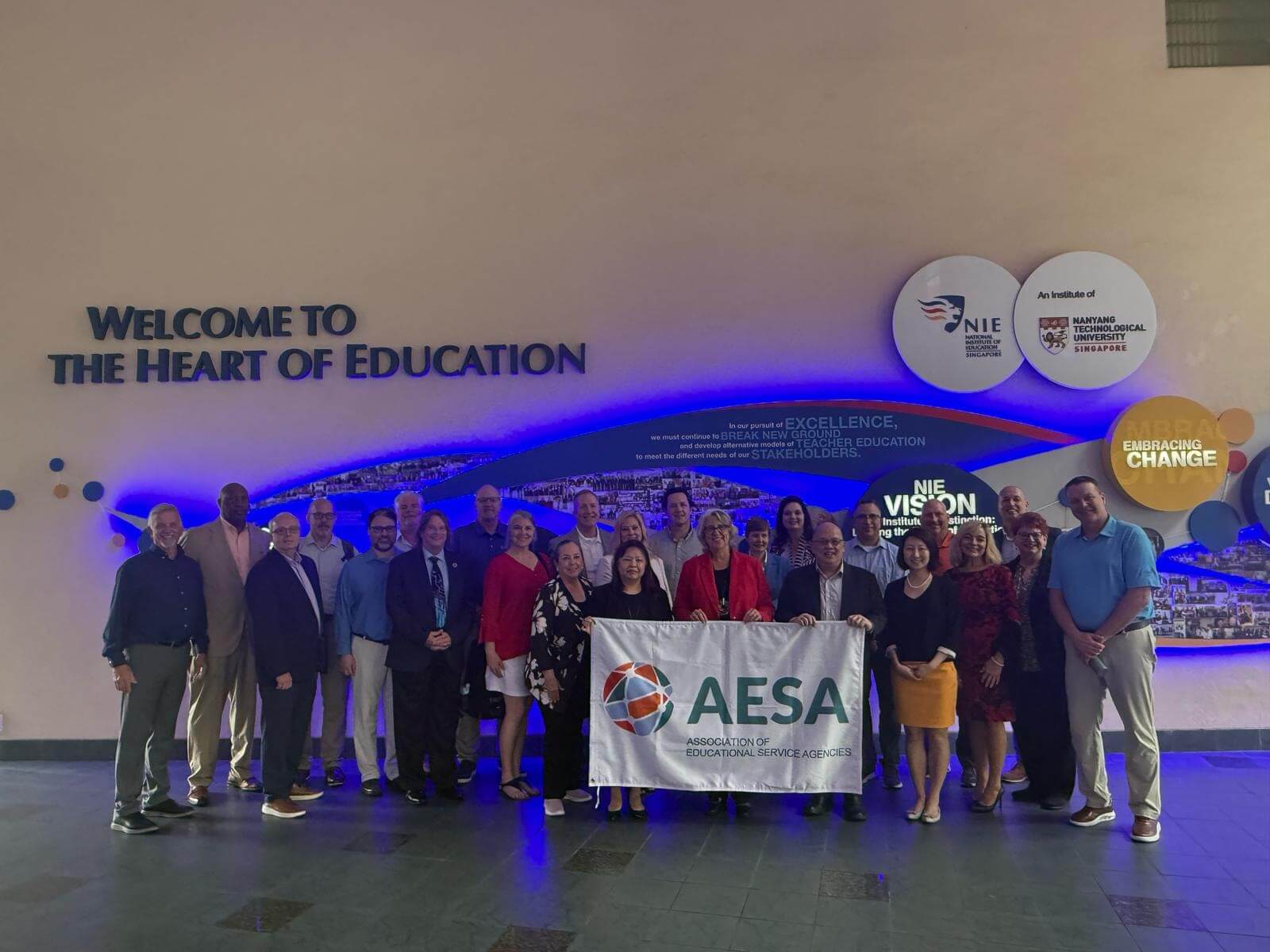 Group photo with banner