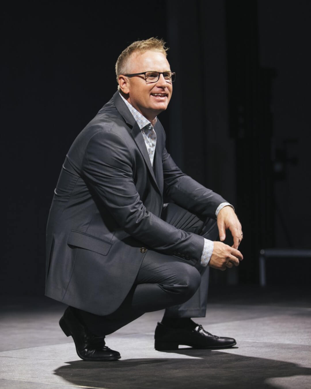 man kneeling