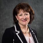 Brunette woman in suit