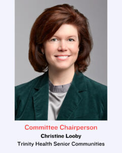 Headshot of woman in green blouse