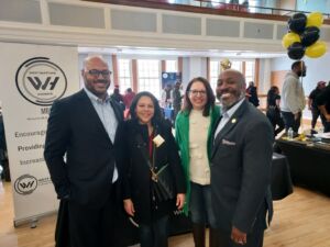 4 People posing at an event
