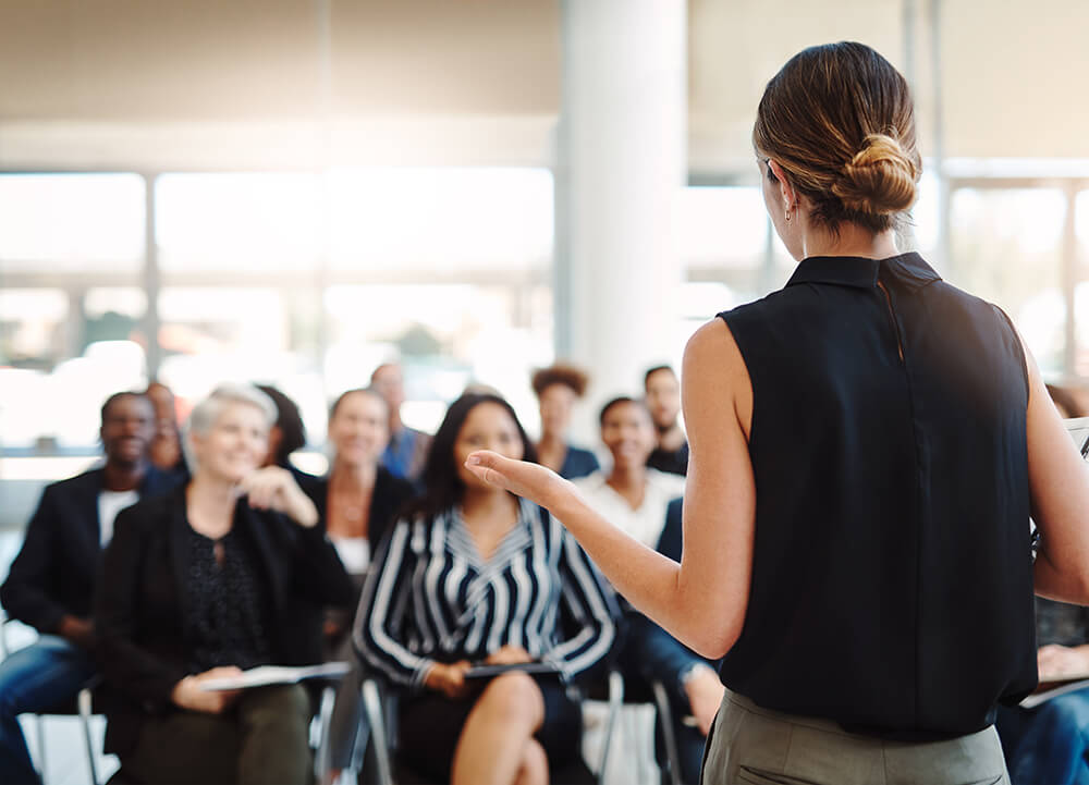 Delivering an informative presentation like a pro Shot of a young businesswoman delivering a speech during a conference
